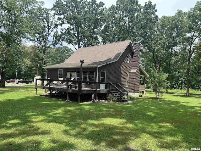 11382 Petroff Rd, Benton, IL 62812 - rear view of property with a wooden deck, a yard, roof with shingles, and a chimney