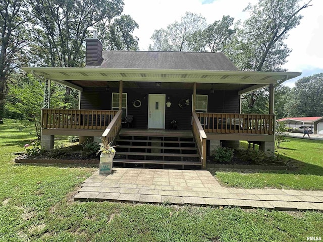 11382 Petroff Rd, Benton, IL 62812 - view of front facade with a chimney, a front yard, a porch, and stairs