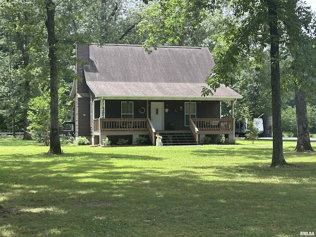 11382 Petroff Rd, Benton, IL 62812 - cape cod home featuring a front lawn, a shingled roof, and a porch