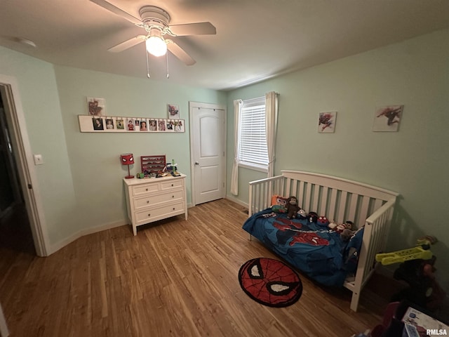 11382 Petroff Rd, Benton, IL 62812 - bedroom with wood finished floors and ceiling fan