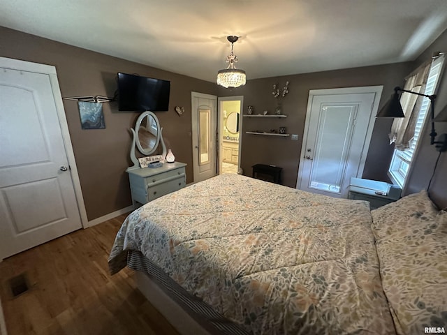 11382 Petroff Rd, Benton, IL 62812 - bedroom featuring wood finished floors and baseboards