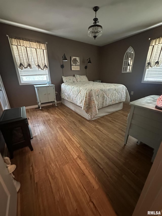 11382 Petroff Rd, Benton, IL 62812 - bedroom with wood finished floors and baseboards