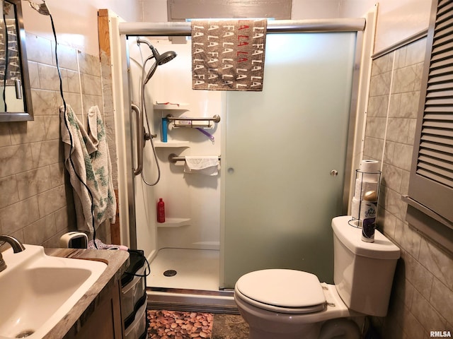 1809 Cherry St, Mount Vernon, IL 62864 - bathroom with tile walls, a stall shower, and vanity