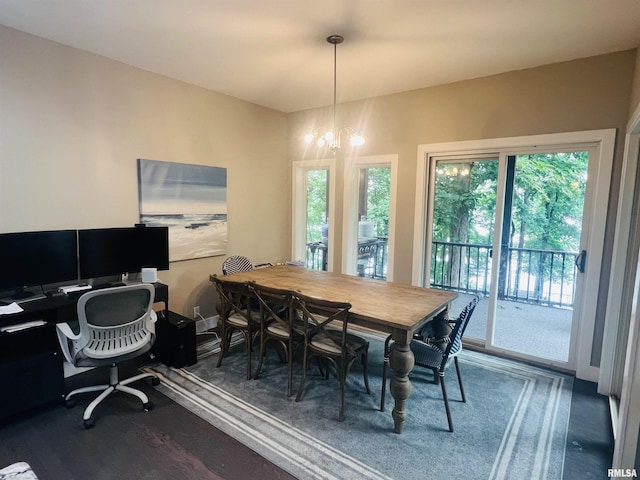 65 Stony Pt, Goreville, IL 62939 - dining room featuring wood finished floors, a chandelier, and a desk