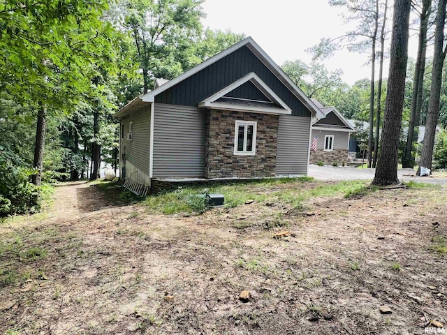 65 Stony Pt, Goreville, IL 62939 - view of side of property with stone siding
