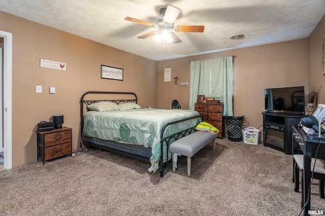 13399 S County Line Rd, West Frankfort, IL 62896 - carpeted bedroom featuring ceiling fan and a textured ceiling