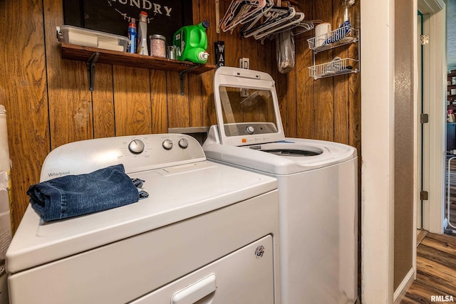 13399 S County Line Rd, West Frankfort, IL 62896 - laundry room with independent washer and dryer, wooden walls, and wood finished floors