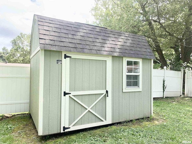 1203 W Goodall St, Marion, IL 62959 - view of shed featuring a fenced backyard