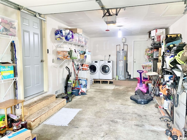 1203 W Goodall St, Marion, IL 62959 - garage featuring electric water heater, washing machine and dryer, and a garage door opener