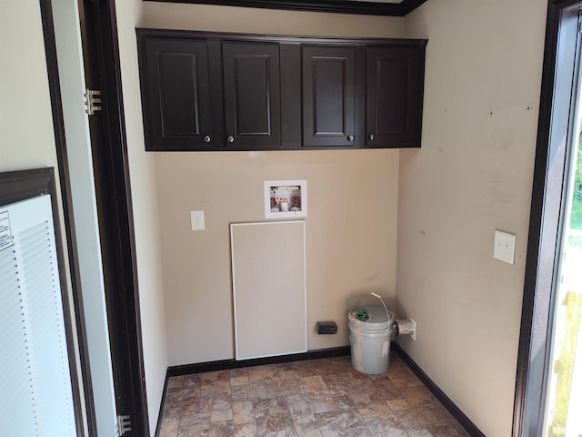 45 Davis Ridge Rd, Eldorado, IL 62930 - laundry room featuring hookup for a washing machine, stone finish flooring, and cabinet space