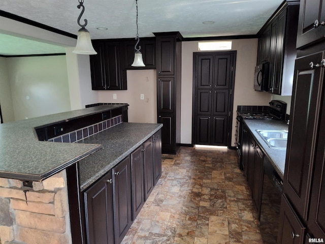 45 Davis Ridge Rd, Eldorado, IL 62930 - kitchen with black appliances, dark countertops, stone finish floors, a kitchen island, and decorative light fixtures