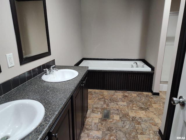 45 Davis Ridge Rd, Eldorado, IL 62930 - full bath featuring double vanity, a bath, and stone finish floors