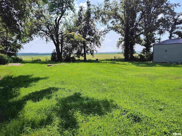 45 Davis Ridge Rd, Eldorado, IL 62930 - view of green lawn with a rural view and an outdoor structure