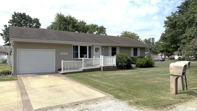 1409 Rig, Salem, IL 62881 - ranch-style home featuring a porch, a garage, a front yard, and concrete driveway