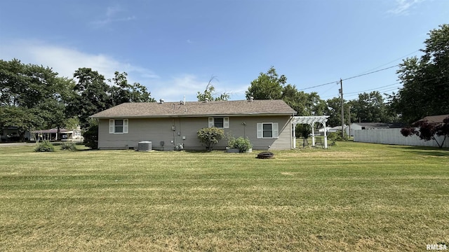1409 Rig, Salem, IL 62881 - back of property with a lawn and a pergola