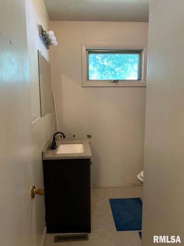 600 W Collins St, Goreville, IL 62939 - bathroom featuring vanity and tile patterned flooring