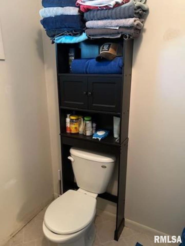 600 W Collins St, Goreville, IL 62939 - bathroom with toilet and tile patterned flooring