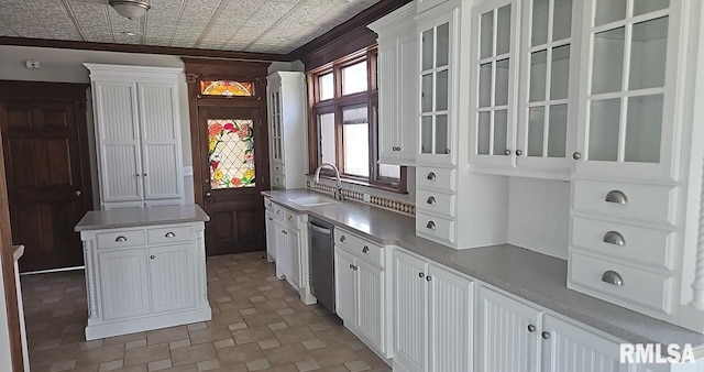 202 E 8th St, Mount Carmel, IL 62863 - kitchen with an ornate ceiling, white cabinets, glass insert cabinets, and stainless steel dishwasher