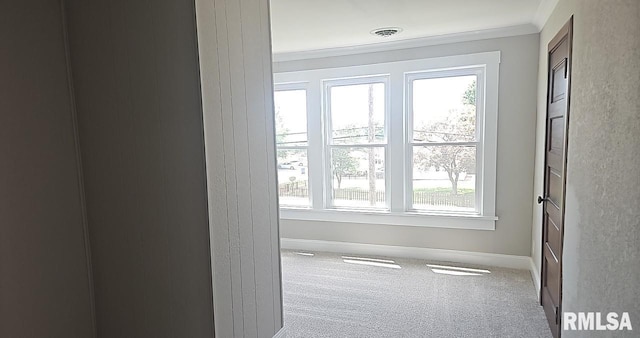 202 E 8th St, Mount Carmel, IL 62863 - entryway featuring healthy amount of natural light, carpet flooring, and crown molding