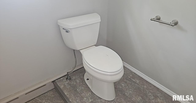 202 E 8th St, Mount Carmel, IL 62863 - bathroom featuring toilet and baseboards