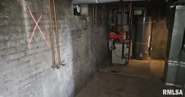 202 E 8th St, Mount Carmel, IL 62863 - unfinished below grade area featuring water heater