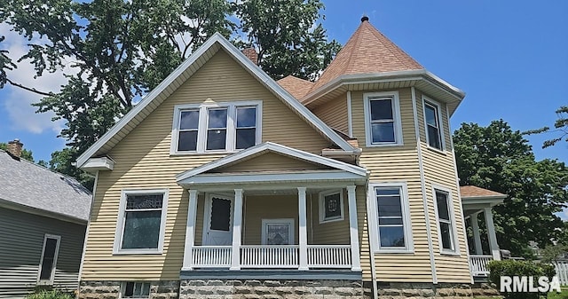 202 E 8th St, Mount Carmel, IL 62863 - view of front of home with a porch