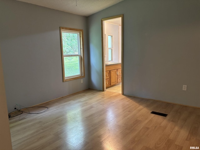 2780 Campground Rd, Anna, IL 62906 - spare room with light wood finished floors and a textured ceiling