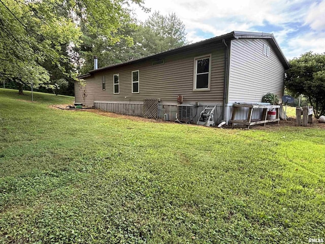 2780 Campground Rd, Anna, IL 62906 - view of home's exterior with a lawn and a central air condition unit