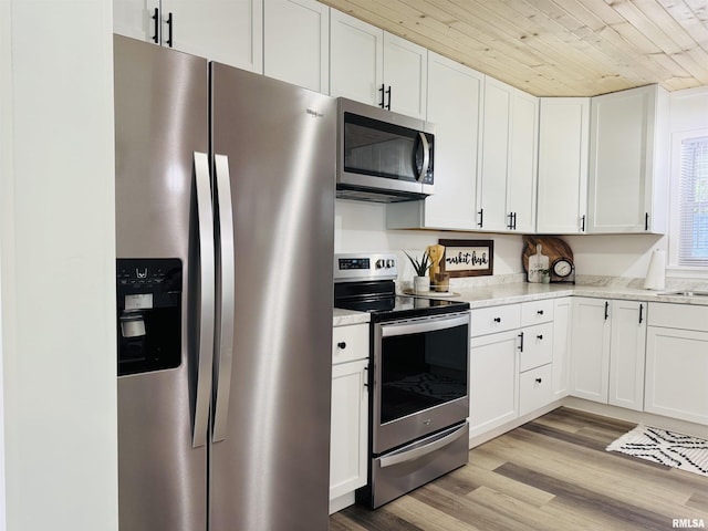 510 Morgan St, Anna, IL 62906 - kitchen with stainless steel appliances, white cabinets, wooden ceiling, light wood-style floors, and light stone countertops