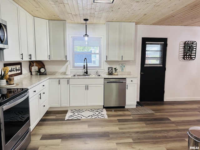 510 Morgan St, Anna, IL 62906 - kitchen featuring appliances with stainless steel finishes, wood ceiling, white cabinets, and healthy amount of natural light