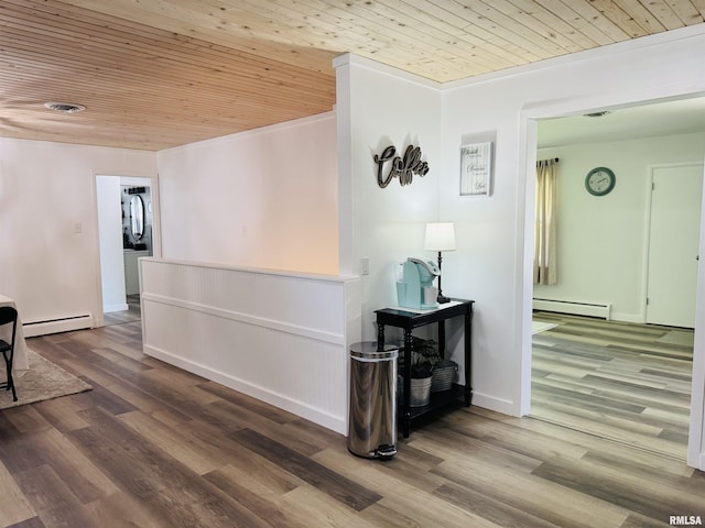 510 Morgan St, Anna, IL 62906 - corridor featuring wooden ceiling, baseboard heating, and wood finished floors