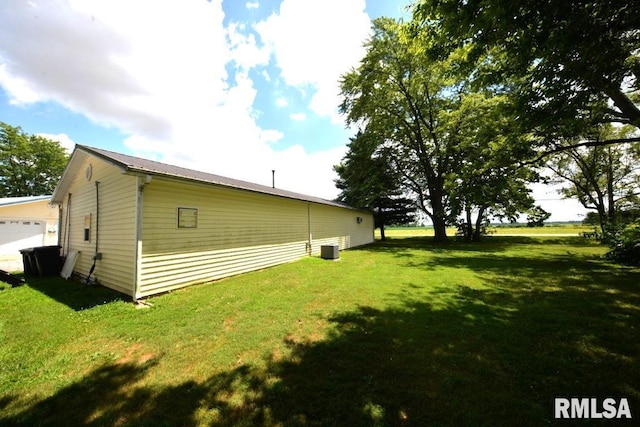 793 County Road 635 E, Wayne City, IL 62895 - view of property exterior featuring a yard and a metal roof