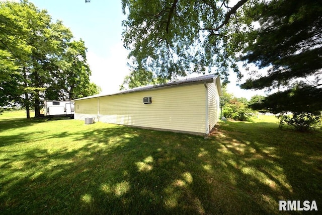 793 County Road 635 E, Wayne City, IL 62895 - view of side of property with a yard