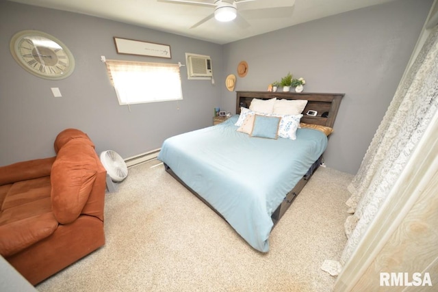 793 County Road 635 E, Wayne City, IL 62895 - carpeted bedroom featuring a wall mounted AC, a baseboard heating unit, and ceiling fan