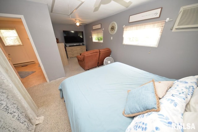 793 County Road 635 E, Wayne City, IL 62895 - bedroom with baseboard heating, attic access, carpet flooring, and a ceiling fan