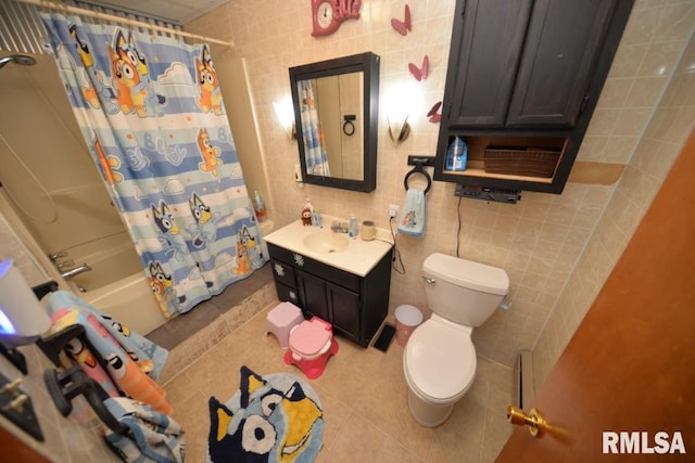 793 County Road 635 E, Wayne City, IL 62895 - bathroom featuring tile walls, tile patterned floors, vanity, and shower / tub combo with curtain