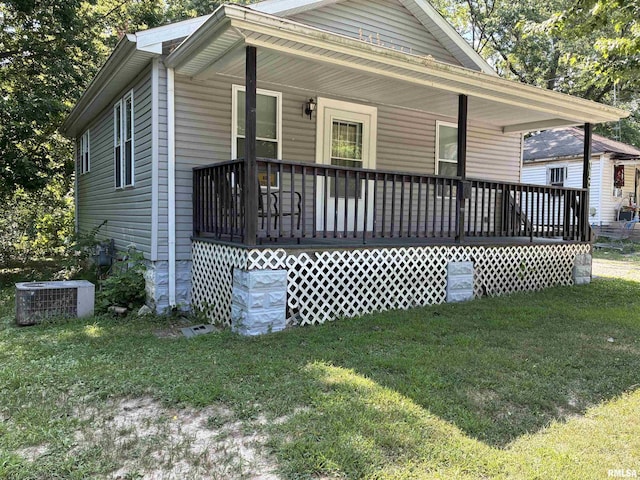 415 S 4th St, Mount Vernon, IL 62864 - view of front of property featuring covered porch and a front lawn