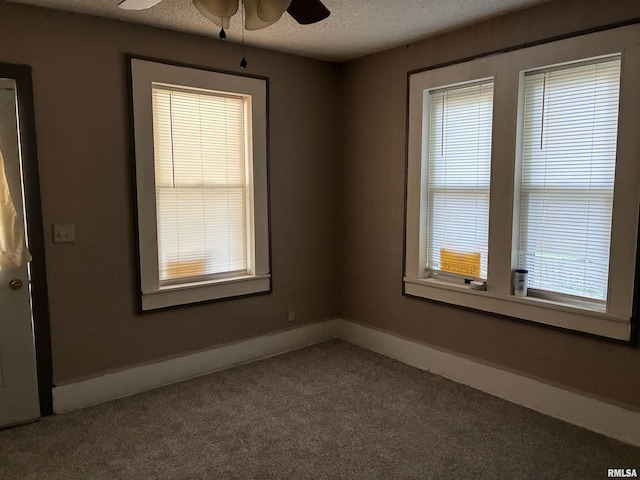 415 S 4th St, Mount Vernon, IL 62864 - carpeted empty room with ceiling fan and a textured ceiling