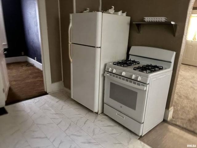 415 S 4th St, Mount Vernon, IL 62864 - kitchen featuring white appliances and light marble finish flooring