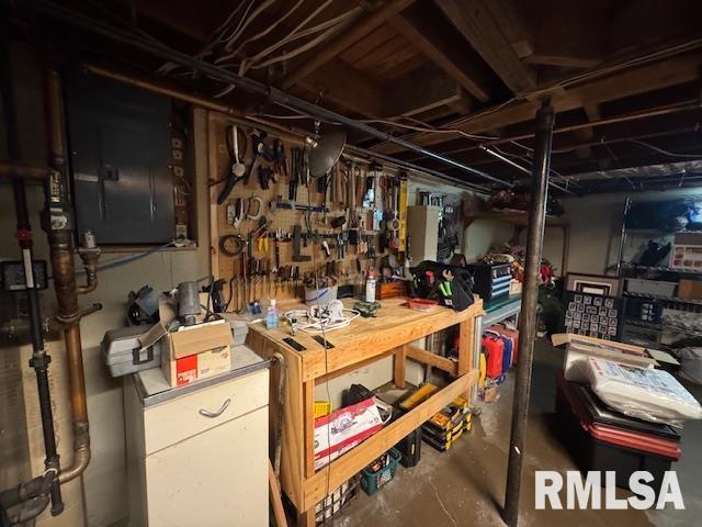 303 Elles Ave, Carterville, IL 62918 - unfinished basement with a workshop area