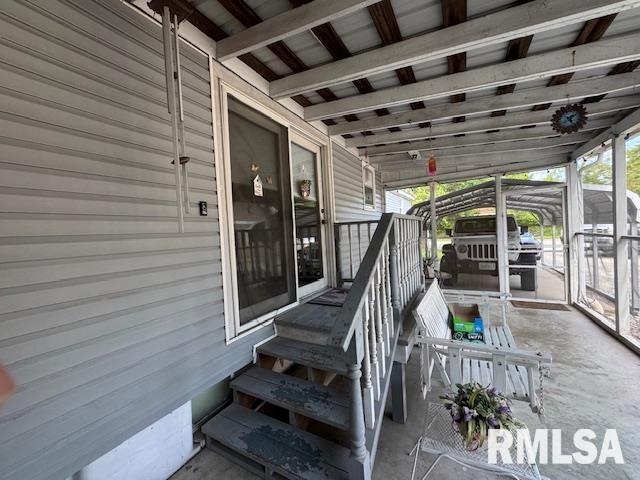 303 Elles Ave, Carterville, IL 62918 - unfurnished sunroom featuring entry steps