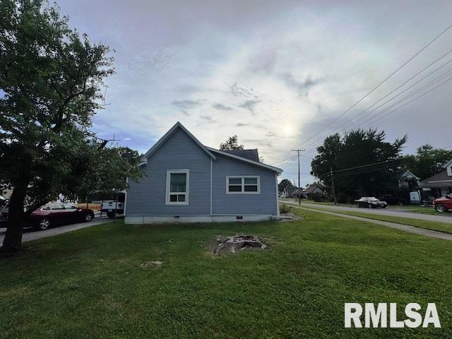 303 Elles Ave, Carterville, IL 62918 - view of side of home featuring a lawn
