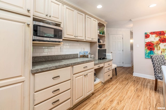 103 Woodland Trl, Anna, IL 62906 - kitchen featuring stainless steel microwave, dark countertops, open shelves, ornamental molding, and backsplash