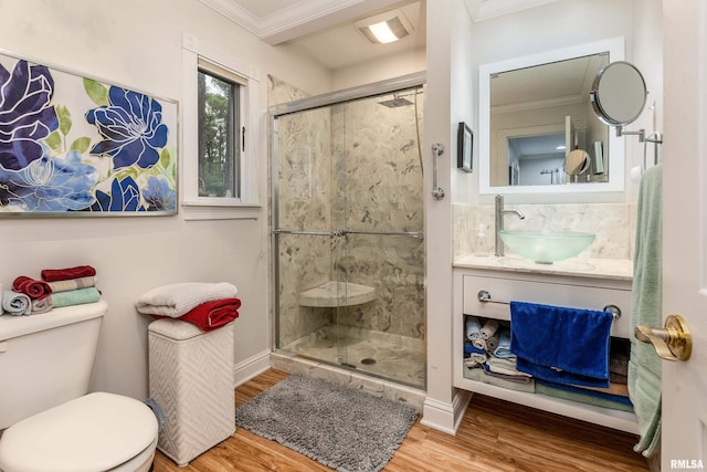 103 Woodland Trl, Anna, IL 62906 - bathroom with a shower stall, wood finished floors, ornamental molding, and vanity