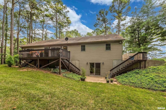 103 Woodland Trl, Anna, IL 62906 - rear view of property featuring stairway, a deck, a lawn, and a patio