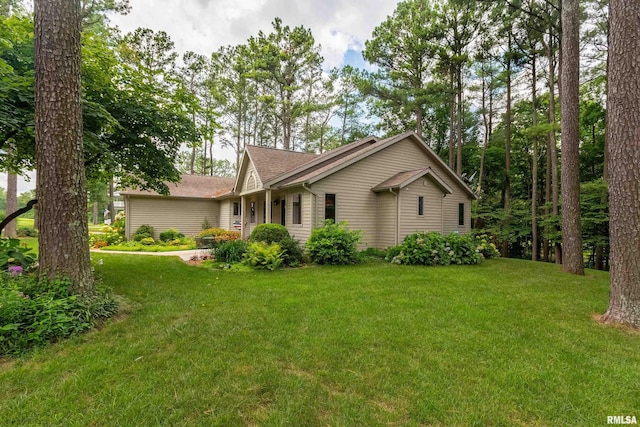103 Woodland Trl, Anna, IL 62906 - view of front of home with a front yard and a shingled roof