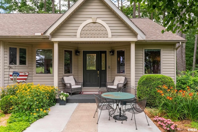 103 Woodland Trl, Anna, IL 62906 - view of exterior entry with a porch and roof with shingles