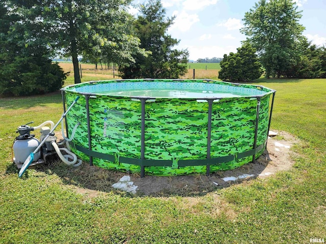 232 Palm Ln, Flora, IL 62839 - outdoor pool featuring a lawn