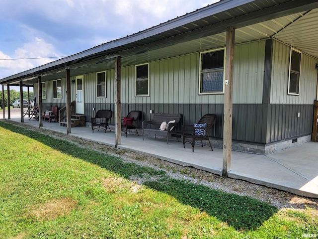 232 Palm Ln, Flora, IL 62839 - rear view of property with a yard, crawl space, entry steps, and a patio