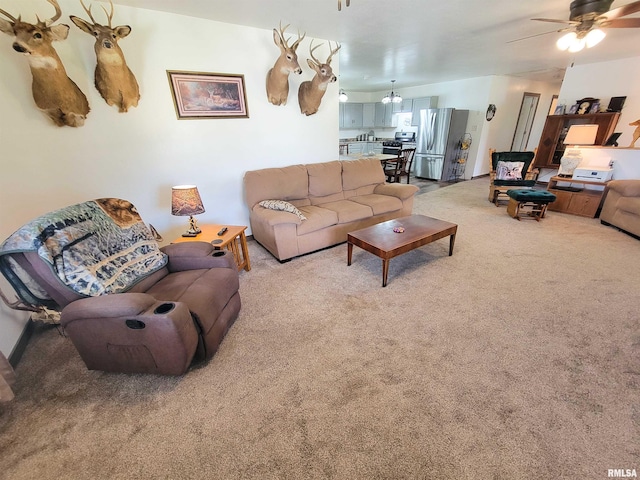 232 Palm Ln, Flora, IL 62839 - living room with light colored carpet and a ceiling fan